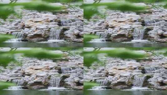 传统中式园林花园假山太湖石瀑布高清在线视频素材下载