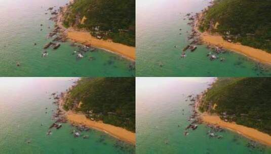 航拍海南三亚大小洞天灯塔椰林海浪礁石沙滩高清在线视频素材下载