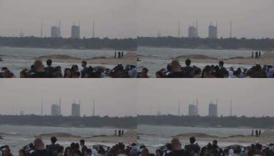 海南文昌淇水湾沙滩看火箭发射人群高清在线视频素材下载