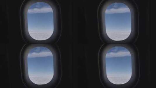 飞机上透过舷窗看风景高清在线视频素材下载