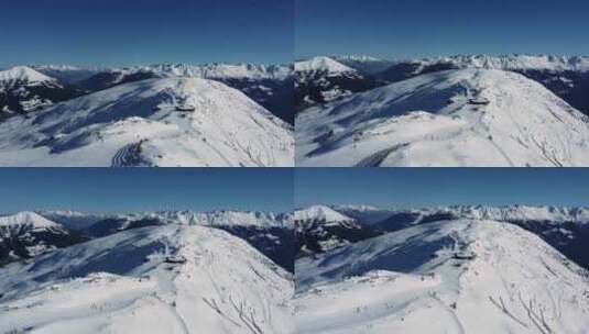 阿尔卑斯山山脊上滑雪者的滑雪坡道，空中高清在线视频素材下载