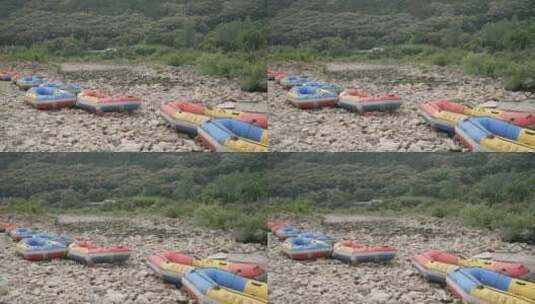 石滩上漂流皮艇河道障碍右向运镜高清在线视频素材下载