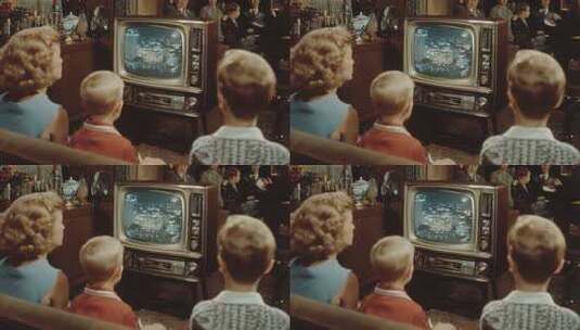 复古家庭观看电视节目城市夜景高清在线视频素材下载