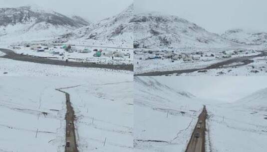 雪山下的雪地村落景象高清在线视频素材下载