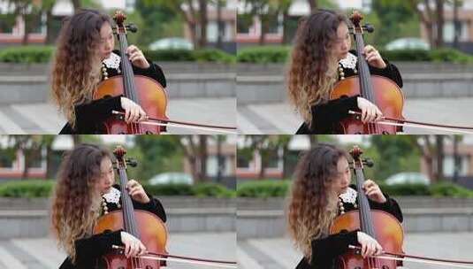 女孩户外演奏大提琴高清在线视频素材下载