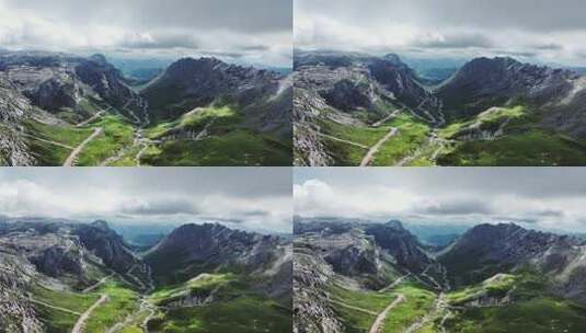 蓝天白云下甘南扎尕那的山脉和山谷中的公路高清在线视频素材下载