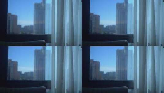 室内透过窗户看城市高楼高清在线视频素材下载