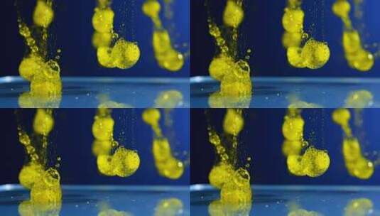 黄色液体滴落微距画面高清在线视频素材下载