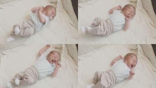 新生婴儿躺在床上哭泣高清在线视频素材下载