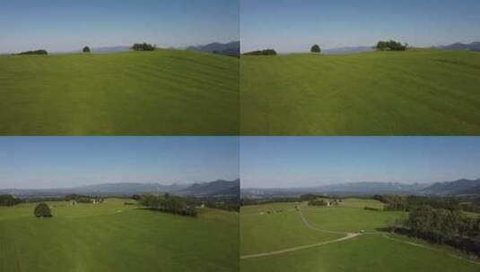 航拍春天绿色的山丘草原高清在线视频素材下载