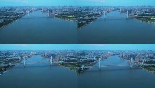 航拍海南海口世纪大桥城市蓝调夜景风景高清在线视频素材下载
