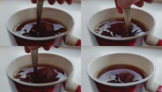 用勺子搅动茶叶高清在线视频素材下载