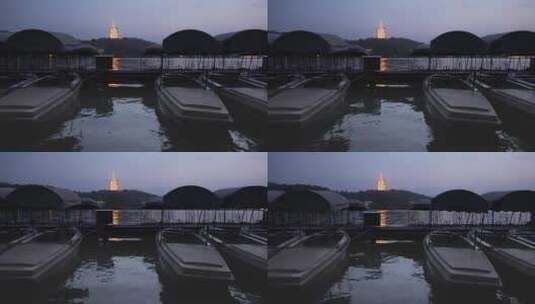 夜晚西湖风景区游船码头和雷峰塔夜景高清在线视频素材下载