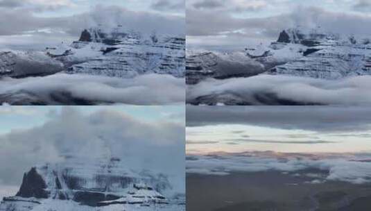 航拍西藏塔尔钦冈仁波齐雪山晨雾高清在线视频素材下载