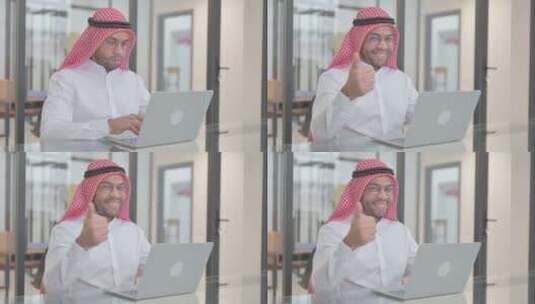 工作中的年轻阿拉伯人竖起大拇指高清在线视频素材下载