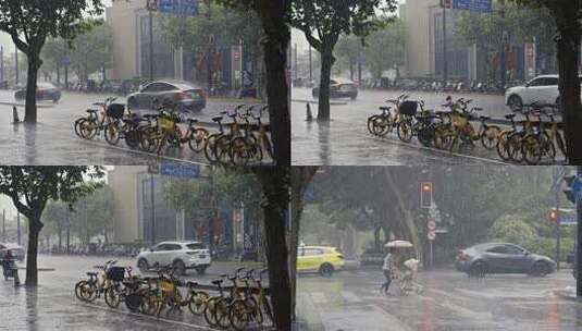 大雨下的马路街道和行人/4k/固定镜头高清在线视频素材下载