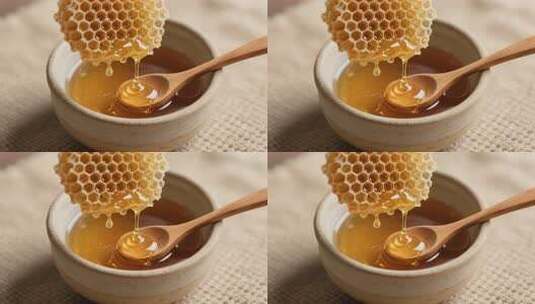 碗中蜂巢蜜滴入蜂蜜画面高清在线视频素材下载