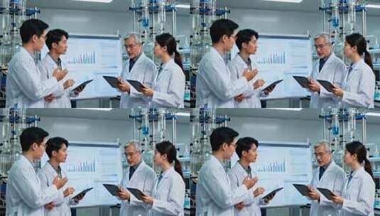 实验室科研人员探讨科研数据高清在线视频素材下载