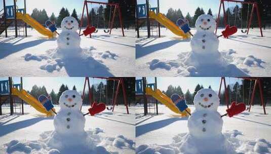 公园雪地中的雪人及游乐设施高清在线视频素材下载