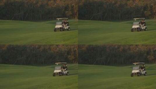 高尔夫球手在球场上乘坐手推车高清在线视频素材下载