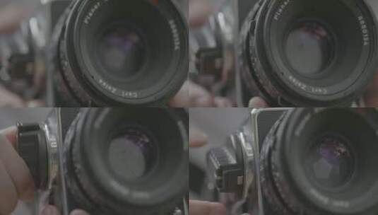古董相机哈苏徕卡空镜头唯美 摄影师按快门高清在线视频素材下载