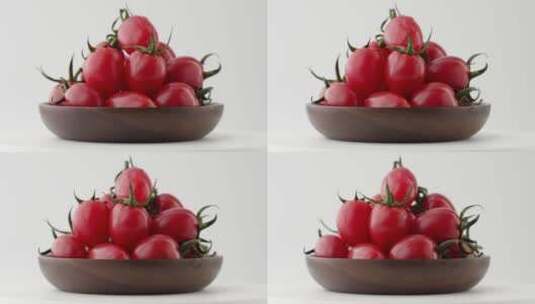 旋转拍摄碗中有机小番茄高清在线视频素材下载