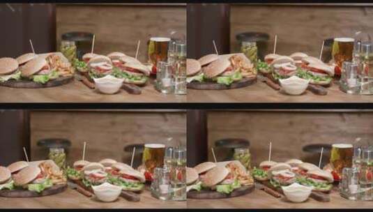 汉堡配新鲜沙拉和啤酒高清在线视频素材下载