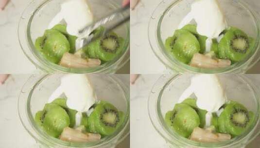 绿色水果果泥搅拌机打水果奶昔高清在线视频素材下载