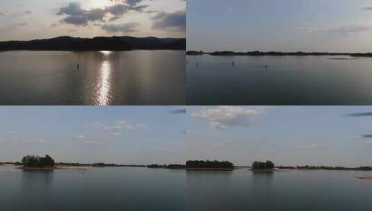桨板湖面夕阳黄昏意境唯美高清在线视频素材下载