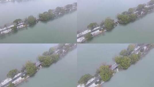 航拍雪中杭州西湖-望山桥高清在线视频素材下载