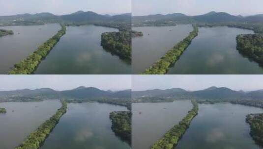 杭州 西湖 苏堤 带船航拍平飞高清在线视频素材下载