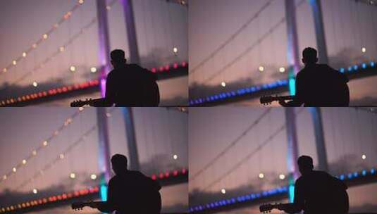 孤独的男孩在天桥下弹吉他高清在线视频素材下载