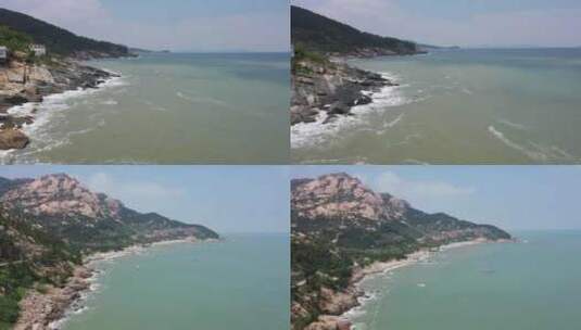青岛航拍海岸线浪花岩石大山高清在线视频素材下载