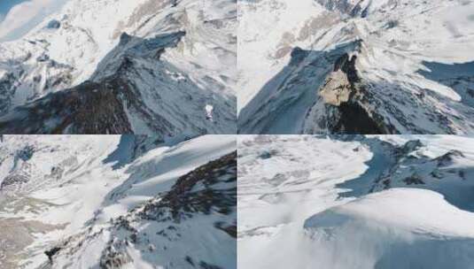 4k穿越机从雪山俯冲而下高清在线视频素材下载