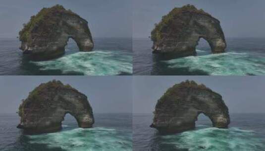 HDR印尼佩尼达岛航拍岛屿海蚀洞风光高清在线视频素材下载
