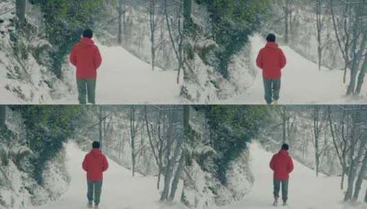 男子雪中行走高清在线视频素材下载