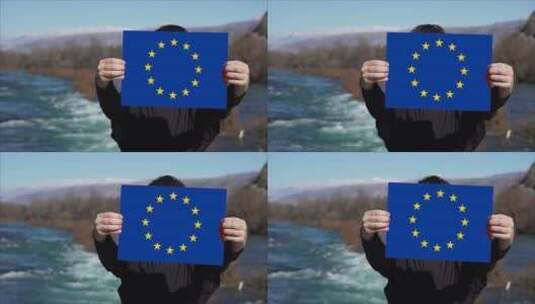 手持欧盟旗帜的人高清在线视频素材下载