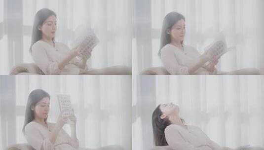 女性室内安静阅读书籍高清在线视频素材下载