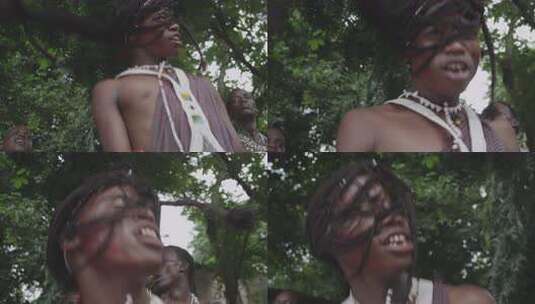 非洲坦桑尼亚色非洲马赛人穿传统服装跳舞唱歌彩斑斓的珠饰项链特写高清在线视频素材下载