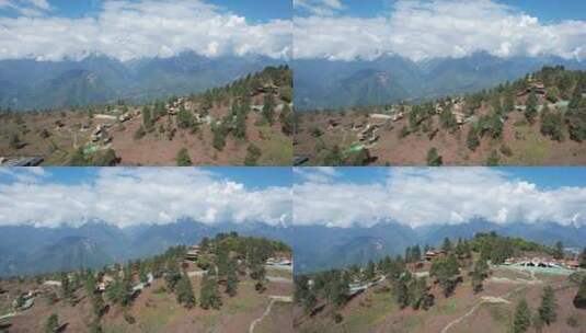 阿鲁腊卡山间村落与远处雪山全景高清在线视频素材下载