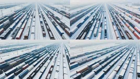 雪中铁轨上停放众多货运火车高清在线视频素材下载