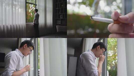 男子窗边抽烟高清在线视频素材下载