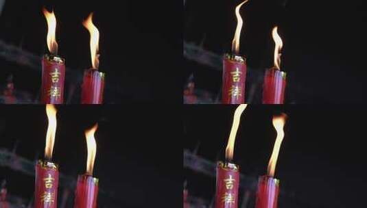 吉祥祈福的红色燃烧蜡烛高清在线视频素材下载