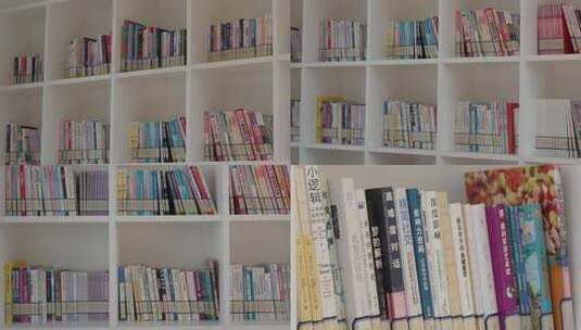 书架上整齐摆放的各类书籍高清在线视频素材下载