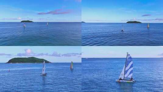 海上帆船与岛屿远景特写高清在线视频素材下载