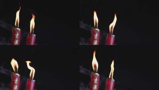 吉祥祈福的红色燃烧蜡烛高清在线视频素材下载