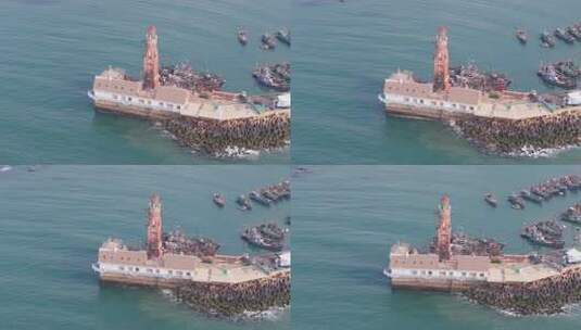 大连渔人码头海上灯塔与停泊渔船航拍高清在线视频素材下载