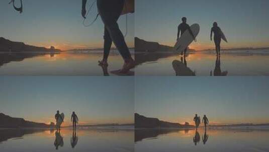 日落的天空下用冲浪板散步高清在线视频素材下载