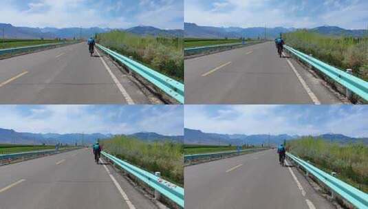 新疆伊犁伊昭公路的户外骑行爱好者高清在线视频素材下载