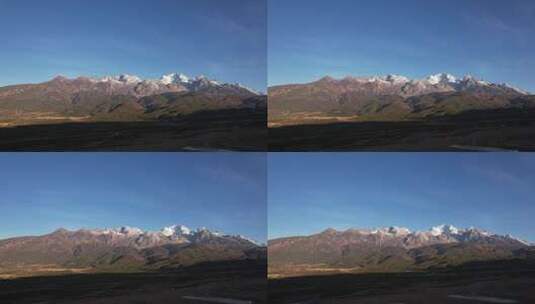 航拍日照金山时的雪山高清在线视频素材下载